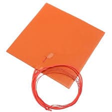 Flexible rubber process heater for conforming to a tank or panel surface
